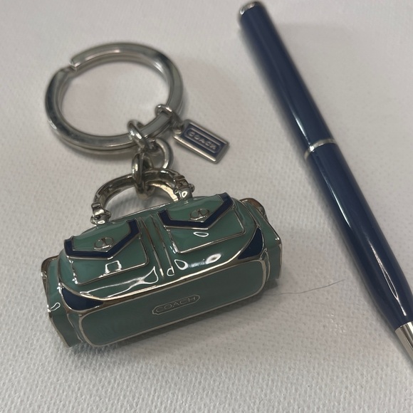 Coach Handbags - Coach Teal and Navy Enamel Bag Keychain and Black Vintage Coach Pen